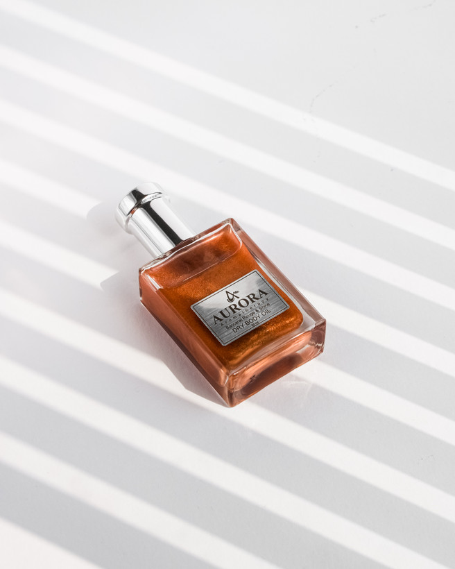 روغن خشک عطری آرورا با رایحه باکارات رژ و شاین برنز