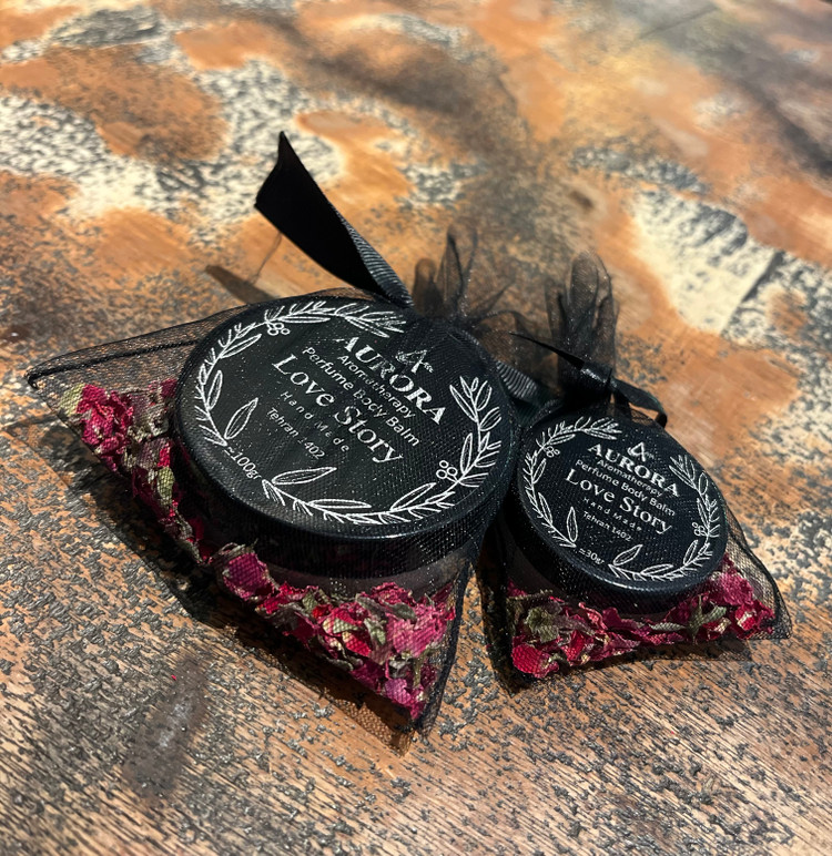 عطر جامد (بالم عطری) آرورا با رایحه لاو استوری